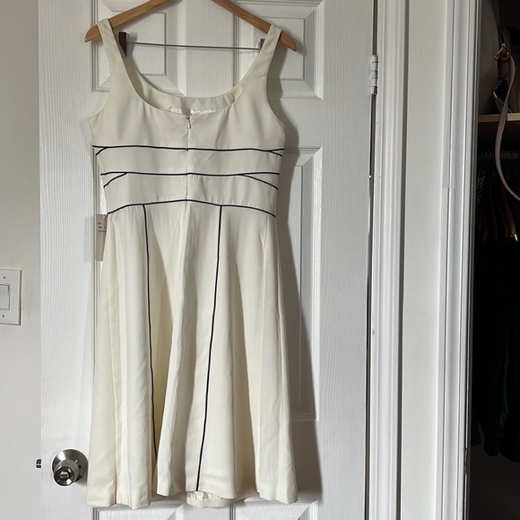 Off white knee length dress with black piping in size 10. Never been worn. - Picture 2 of 6